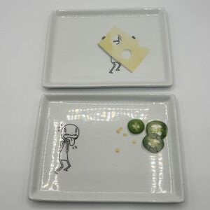 CB2 2011 Stick Figure Ceramic Appetizer Plates Set of 2 Cheese Jalapeño White